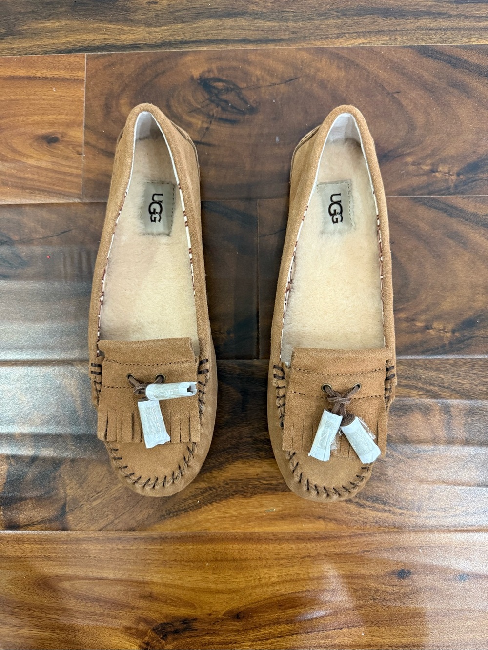 UGG Tan Suede Tassel Moccasins